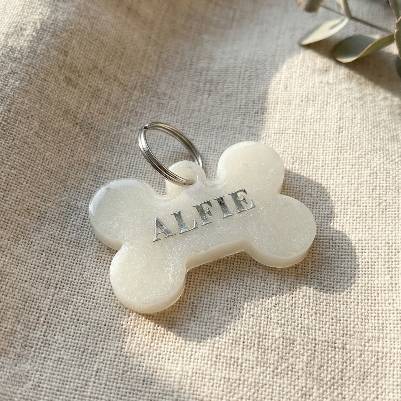 Dog name tag — Snowy Paws